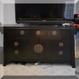 F51. Black Asian-inspired stand. 